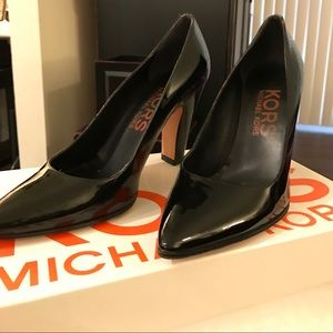 Michael Kors black patent pumps
